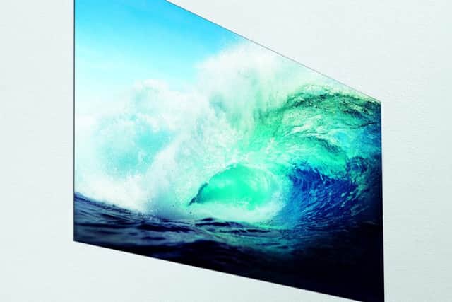Giant, slim TV sets with OLED screens like this one from LG will become commonplace