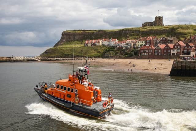Whitby's all-weather lifeboat was called out to help tow a broken down pleasure boat during the fundraising at Whitby Lifeboat Weekend. Saturday 5 August. Picture: Ceri Oakes