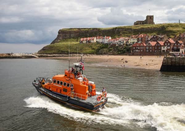 Whitby's all-weather lifeboat was called out to help tow a broken down pleasure boat during the fundraising at  Whitby Lifeboat Weekend. Saturday 5 August. Picture: Ceri Oakes