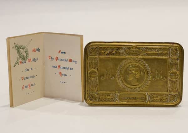Princess Mary brass tin and Christmas card on display at Eden Camp Museum, Malton.