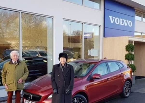 Keith Taylor takes delivery of his new Volvo car, the 20th vehicle bought at Ray Chapman Motors