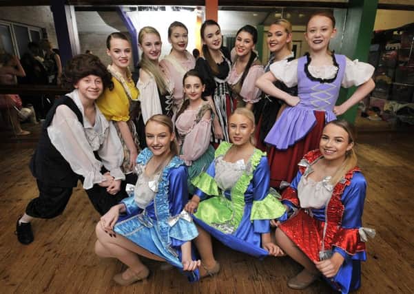Julie Hatton performers prepare for Beauty and the Beast.
