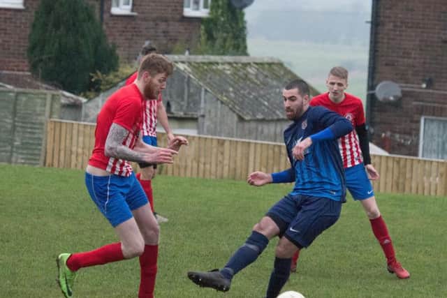 Angel Reserves (blue kit) in action against Radio Scarborough