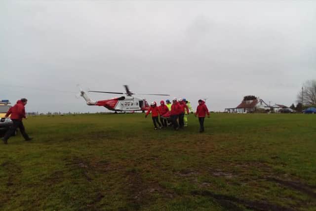 The woman was airlifted to safety