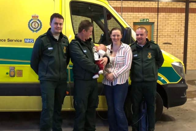 Jennifer and Mayah Iskandar reunited with the lifesaving ambulance crew, from left, Sam Berridge, Mark Ibbetson and Richard Lynah