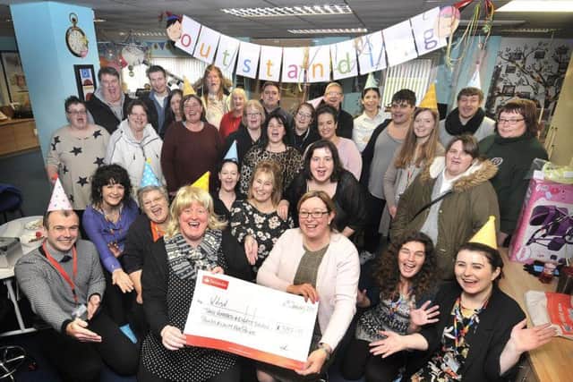 The Happy Futures team celebrate