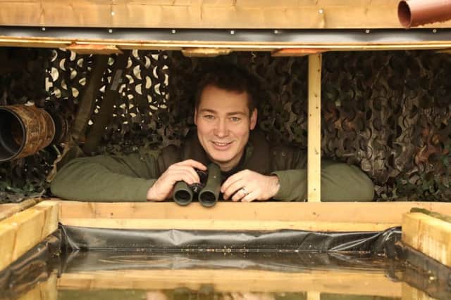 Artist Robert Fuller at Hawfinch Hide