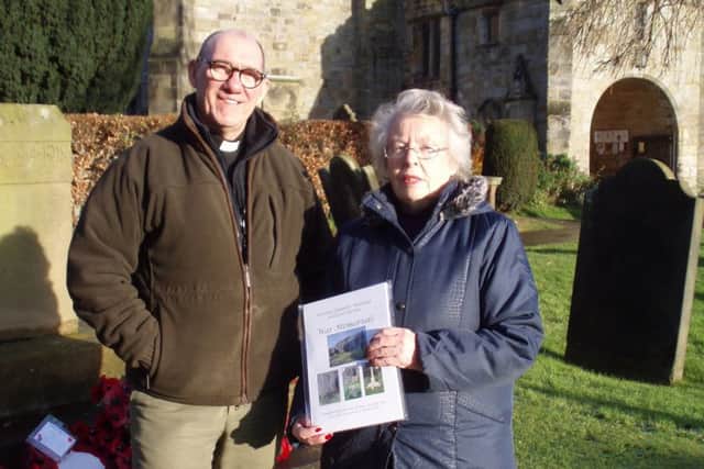 Rita Gibson and Rev Mark Brosman at the War Memorial in Kirkbymoorside.