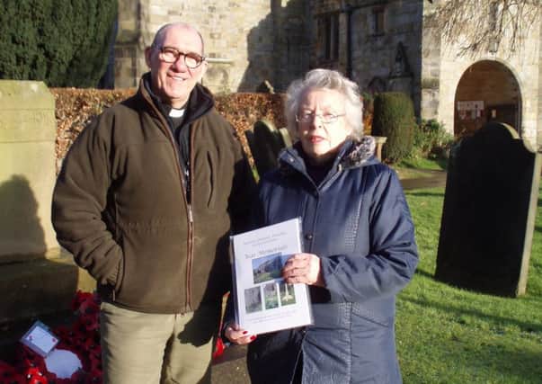 Rita Gibson and Rev Mark Brosman at the War Memorial in Kirkbymoorside.