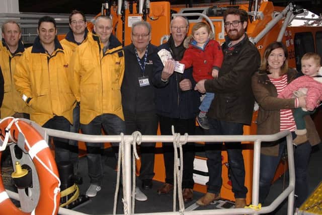 Henry Pulling, his wife Rebecca and their children Joshua, 3, and Esme, 22 months, at the Scarborough lifeboathouse presentation.