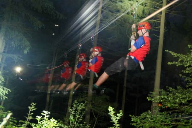 Try zip wiring in the dark at Go Ape, Dalby Forest