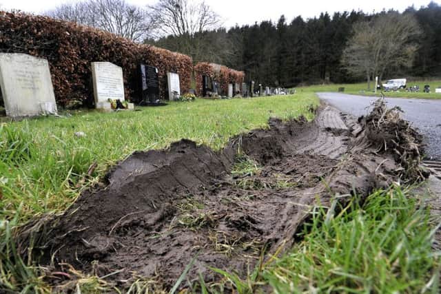 A vehicle had been driven recklessly around the cemetary causing damage to the grassed areas