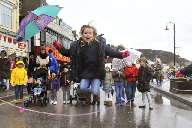 Lillee Pearce enjoys the day despite the weather. 180712c