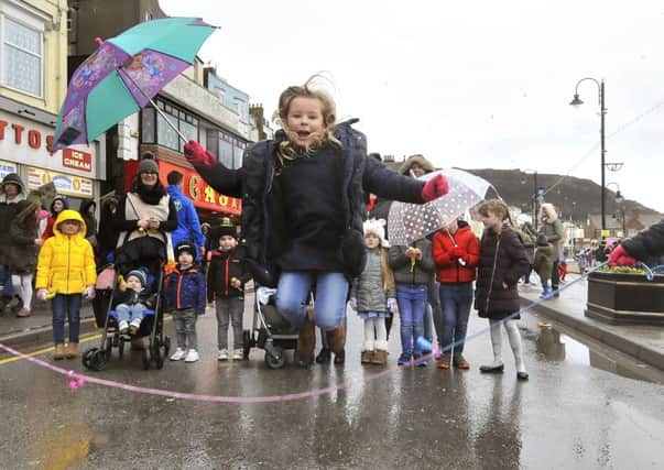 Lillee Pearce enjoys the day despite the weather. 180712c