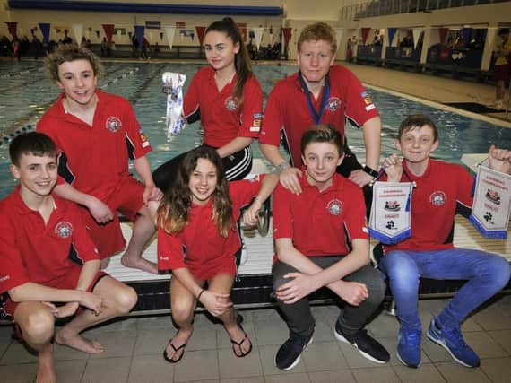 Scarborough swimmers, back from left, Joe Kelly, Amy Corcoran, Angus Leckonby; front, Owen Hobkinson, Alex Beeson, Sam and Joseph Moment. Picture by Richard Ponter