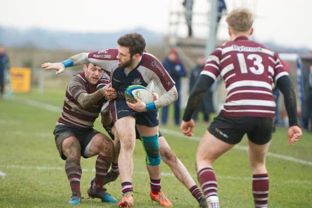 Harry Domett battles with Old Rishworthians