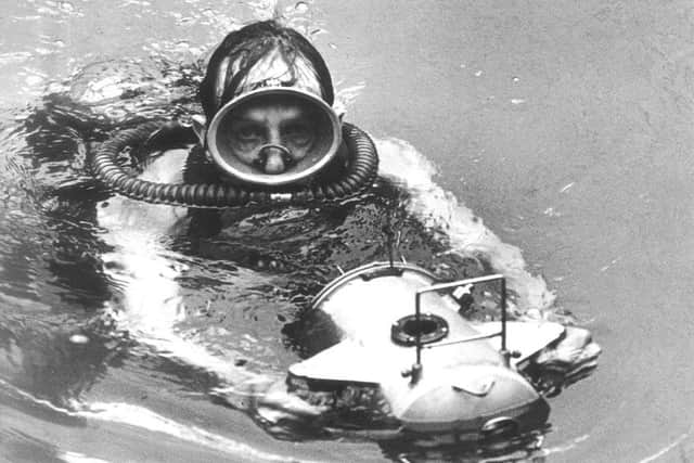 Geoffrey Willey with his underwater camera.