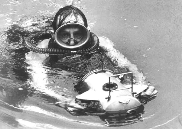 Geoffrey Willey with his underwater camera.