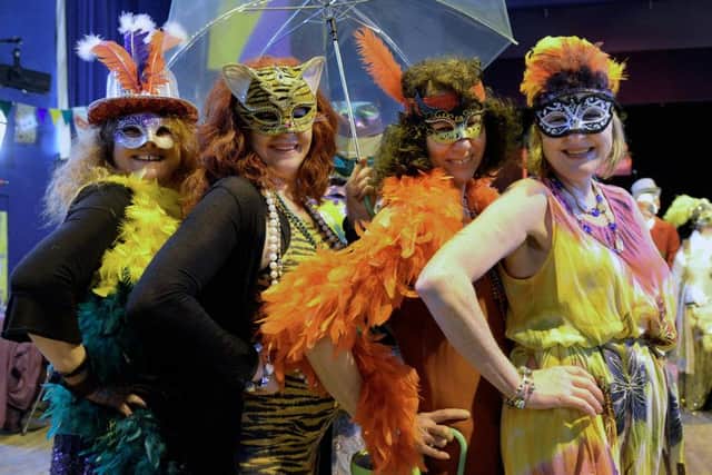 Cajun Festival runs on Saturday and Sunday. A Mardi Gras theme, there will be a parade around the Market Place, led by Rough Chowder, PA1511-29c