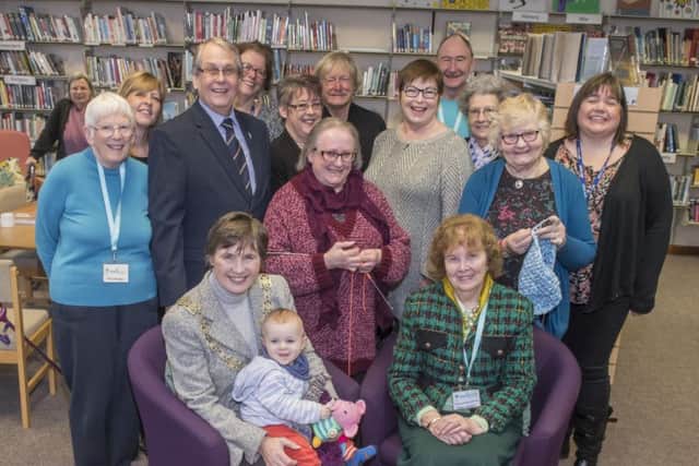 Cllr Helen Swiers and Cllr Elizabeth Shields (seated) celebrate the success of Norton Hive Library and Community Hub.