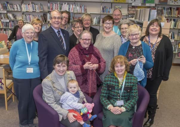 Cllr Helen Swiers and Cllr Elizabeth Shields (seated) celebrate the success of Norton Hive Library and Community Hub.
