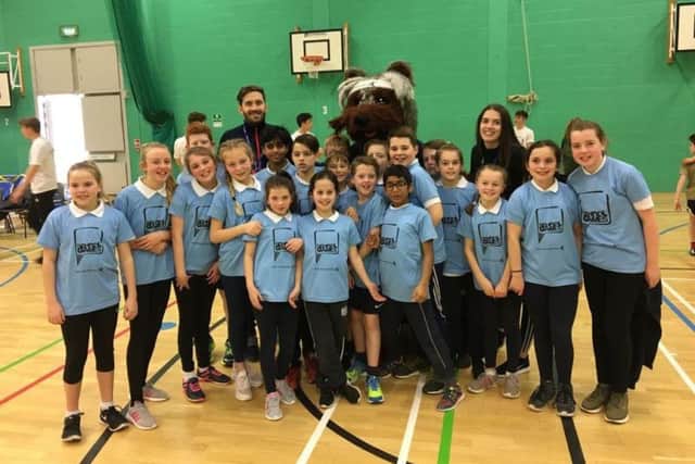 St Peters RC School team members , are back left to right, Meeka Henry, Poppy Rewcroft, Charlotte Browne, Billy Kelly, Tilly Thorpe, Mr Josh Greening (sports-co-ordinator), Ezeki Ebby, Alex Shehi, Elliot Thompson, Ryder Greening, Sebby Holloway, Jack Morrison, Toby Beard, Miss Stacey Thompson, Livie Brown, Molly Murray, Neve Jones, front left to right, Erin Richardson, Juliette Moran, Ben Broadbent, Tom Kelly and Stevo Jose