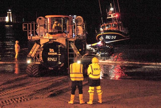 The lifeboat returns. Picture by Dave Barry