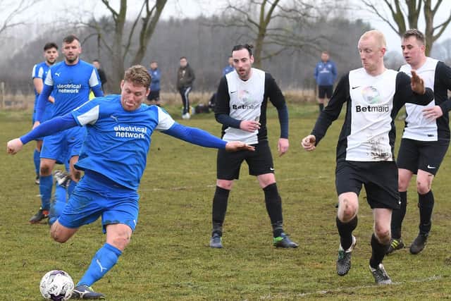 Traf's five-goal hero Liam Salt in action during the semi-final 6-0 win against Village Park Rangers