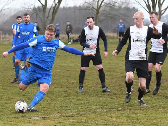 Traf's five-goal hero Liam Salt in action during the semi-final 6-0 win against Village Park Rangers