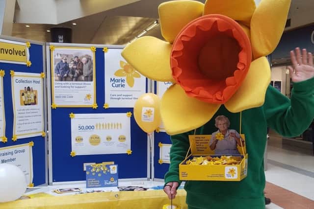 Marie Curie mascot, Daffy, at the Marie Curie stall in Scarborough's Brunswick Pavilion.