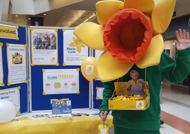 Marie Curie mascot, Daffy, at the Marie Curie stall in Scarborough's Brunswick Pavilion.