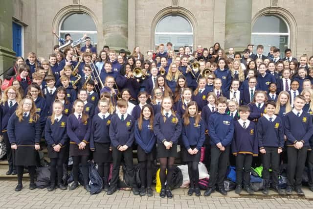 The talented musicians pose for a group picture before St Augustines Easter Concert at Westborough Methodist Church.
