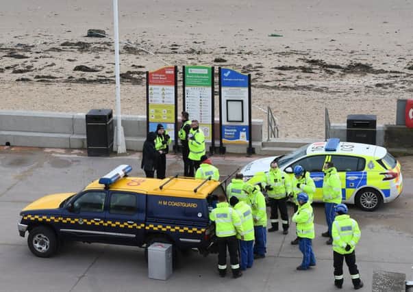 Police and coastguards at the scene on Saturday morning