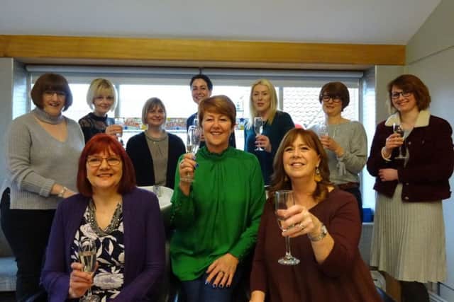 Mandy Silk (in green) and some of the past and present Viva Hair employees at the Mannions reunion.