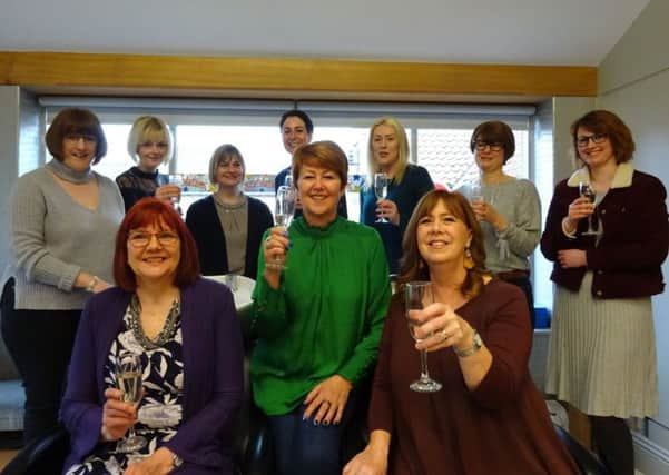 Mandy Silk (in green) and some of the past and present Viva Hair employees at the Mannions reunion.