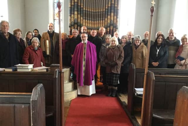 Rev Stephen Walker, churchwardens, architect Peter Pace, Yorkshire Historic Churches Trusts Andrew Boyce and parishioners at the church.