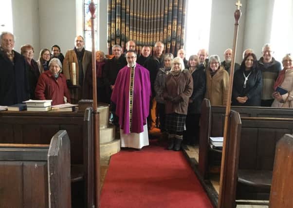 Rev Stephen Walker, churchwardens, architect Peter Pace, Yorkshire Historic Churches Trusts Andrew Boyce and parishioners at the church.