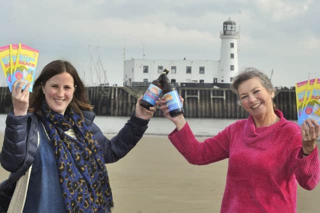 Books by the Beach on Scarborough's South Bay . Wold Top Brewery Manager Kate Balchin and Books by the Beach organiser Heather French. pic richard Ponter 180922d