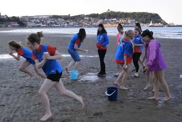 Guides having fun on the beach.