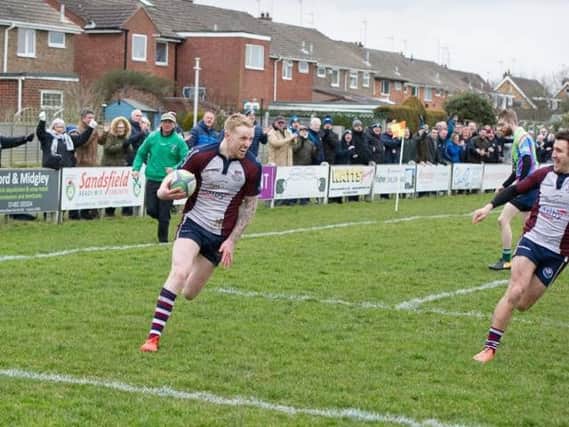 Matty Young races through for his try in the 31-20 win for Scarborough RUFC at promotion rivals Beverley   Picture: Andy Standing