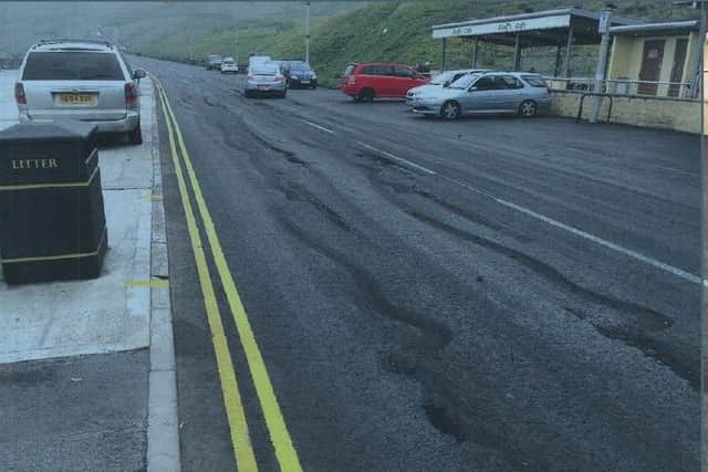 A photograph of the damage caused to Royal Albert Drive in Scarborough issued by North Yorkshire Police.