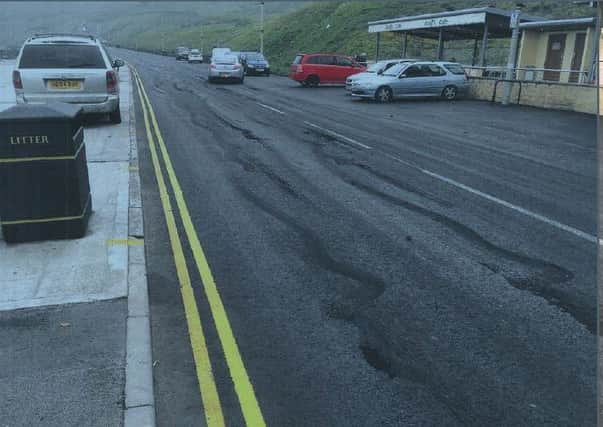 A photograph of the damage caused to Royal Albert Drive in Scarborough issued by North Yorkshire Police.