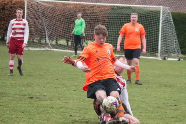 Cayton challenge Snainton in their Division Two clash. Picture by Steve Lilly.