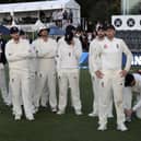 England captain Joe Root, right, stands with his team following the final day of the second Test against New Zealand at Hagley Oval. Picture: AP/Mark Baker