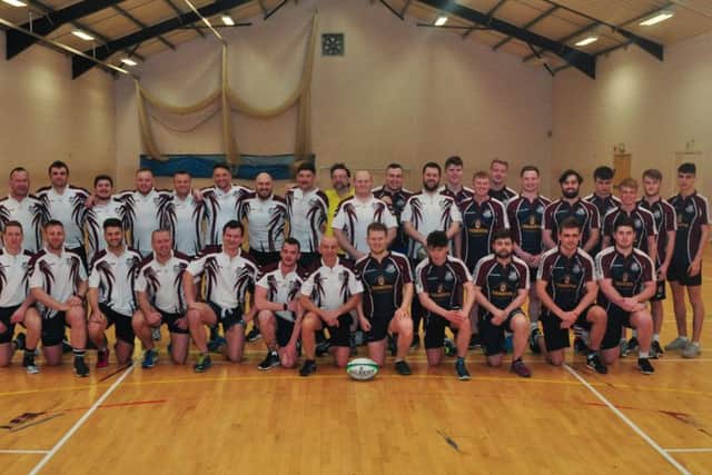 Mos Exiles and Keiths Crusaders line up in the sports hall at Silver Royd before they took part in the annual memorial game in memory of Andrew Mo' Stevenson. Picture by Andy Standing
