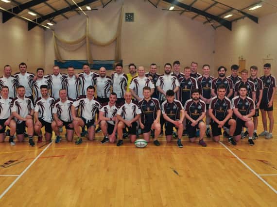 Mos Exiles and Keiths Crusaders line up in the sports hall at Silver Royd before they took part in the annual memorial game in memory of Andrew Mo' Stevenson. Picture by Andy Standing