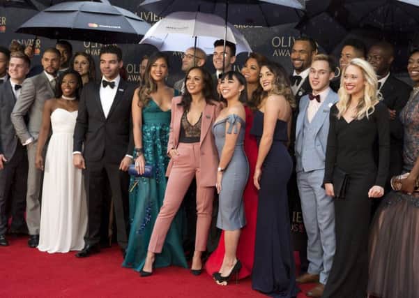 The cast of the musical Hamilton  arriving for The Olivier Awards at the Royal Albert Hall in London.