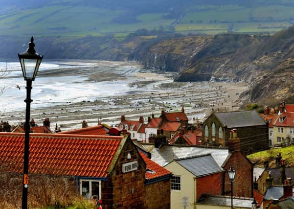 030418     The red roofs of Robin Hoods Bay on the Yorkshire coast .     Pic Post/Countyweek.     Picture taken on  a Nikon D3s camera witha 70-200mm lens at 116 mm with an exposure of 1\100pth sec af f10  with an ISO of 400.
