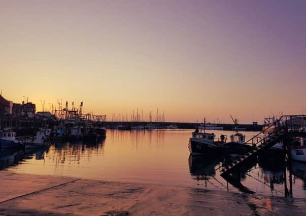 This image of Scarborough Harbour by Carly Swift features in this years St Catherines calendar.