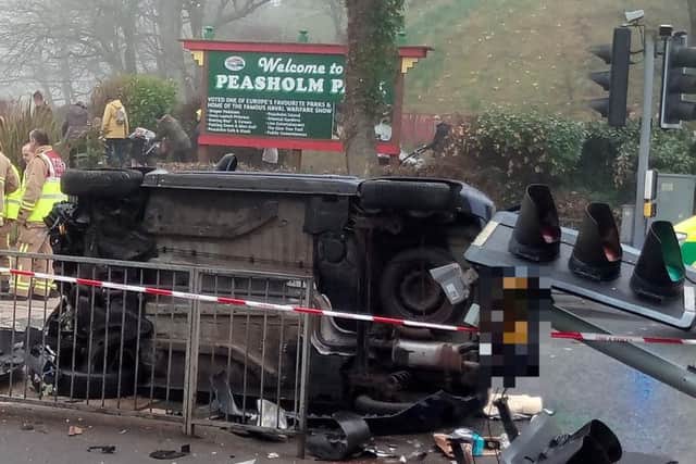 One car flipped onto its side in the crash